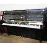 Steinbach (c2007) A Model 108 upright piano in a traditional bright ebonised case.
