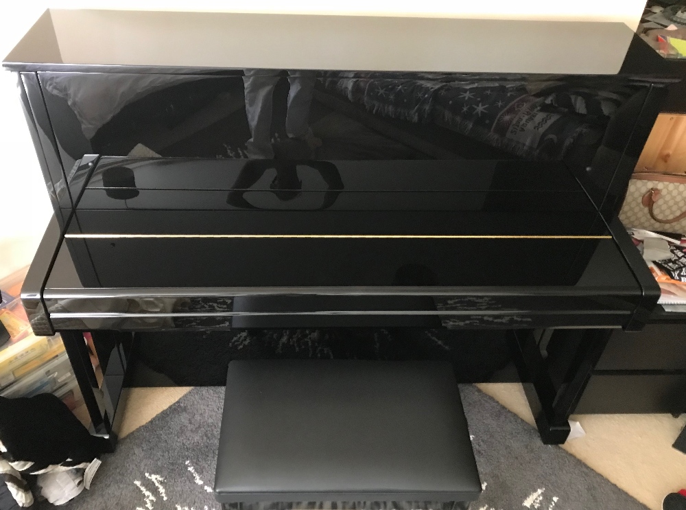 Yamaha (c2016) A Model B3E upright piano in a bright ebonised case; - Image 2 of 3