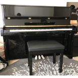 Yamaha (c2016) A Model B3E upright piano in a bright ebonised case;