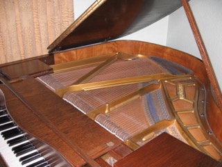 Blüthner (c1935) A 5ft grand piano in a walnut case on square tapered legs. - Image 3 of 3