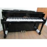 Palatino A Hybrid digital piano with traditional grand piano action in a bright ebonised case.