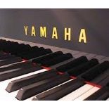 Yamaha (c1981) A Model U3M upright piano in a bright ebonised case.