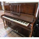 Steinway (c1911) A Vertegrand upright piano in a rosewood case.