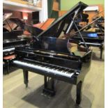 Steinway (c1969) A 6ft 11in Model B grand piano in a bright ebonised case on square tapered legs.