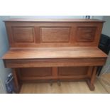 Laurence & Nash (c1980’s) An upright piano in a traditional satin mahogany case with a panelled