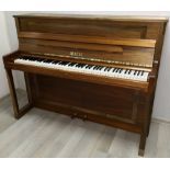 Ibach (c1968) An upright piano in a traditional walnut case with inlaid bands;