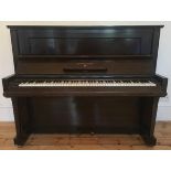 Steinway (c1935) A Model V upright piano in a mahogany case.