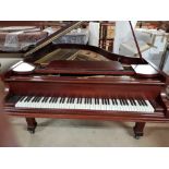 Cramer (c1924) A 6ft grand piano in a rosewood case on square tapered legs.