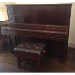 Steinway (c1936) A Model V upright piano in a mahogany case;