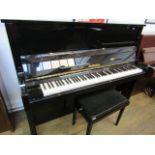 Wendl & Lung (c2006) A Model 122 upright piano in a traditional bright ebonised case;