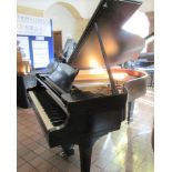 Steinway (c1971) A 5ft 10in Model O grand piano in a bright ebonised case on square tapered legs.