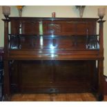 Richard Lipp (c1907) An upright piano in a mahogany case in the Arts and Crafts style with