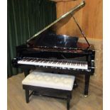 Yamaha (c2008) A 5ft 8in Model C2M grand piano in a bright ebonised case on square tapered legs;