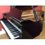 Yamaha (c2002) A 6ft 2in Model C3 grand piano in a bright ebonised case on square tapered legs;