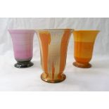 Three Shelley Harmony vases, each raised on a circular foot, 11.