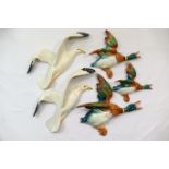 A set of three graduated Beswick flying ducks, the largest 22cm across,