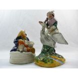 A 19th century Staffordshire figure of Mother Goose, 17.