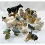 A collection of 14 Royal Doulton figures by John Bewsick, comprised of a Shetland Cow, an Alsatian,