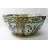 A large Chinese famille rose punch bowl, decorated with figural and floral panels,