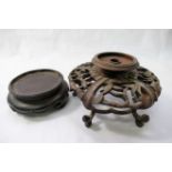 A Chinese circular carved hardwood stand,