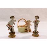 Two small 19th century porcelain figures of Cupid, one modelled holding a flaming heart,