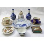 A collection of small porcelain items including a miniature Paris porcelain coffee can and saucer,