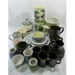 A collection of Iden and Rye Pottery items comprised of five small coffee mugs and six matching