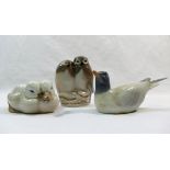 A Royal Copenhagen porcelain group of two owls, numbered 834, 8.