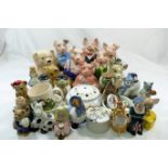 A collection of modern Wade figures including 'Mother Goose', 'Cinderella',