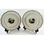 A pair of Regency Staffordshire porcelain plates with gold border,