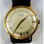 A gentleman's Eska wrist watch, the yellow metal case stamped '18K', the face with baton numerals,