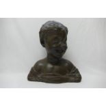 An Italian terracotta bust of the head of a child by Manifattura di Signa, with bronzed finish,