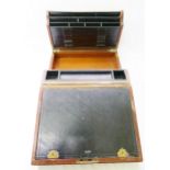 A Victorian leather bound writing slope, the interior fitted with a letter rack,