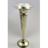 A silver coloured metal trumpet-shaped vase, stamped 'Sterling', with loaded base,