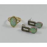 A pair of marcasite and Gilson opal drop earrings and a 9 carat gold single stone opal ring,