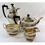 A four piece silver teaset, comprised of a hotwater jug, teapot, sugar bowl and jug,