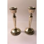 A pair of silver candlesticks, Birmingham 1975, 14cm high,