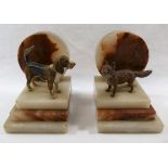 A pair of Art Deco alabaster books ends or clock garniture,