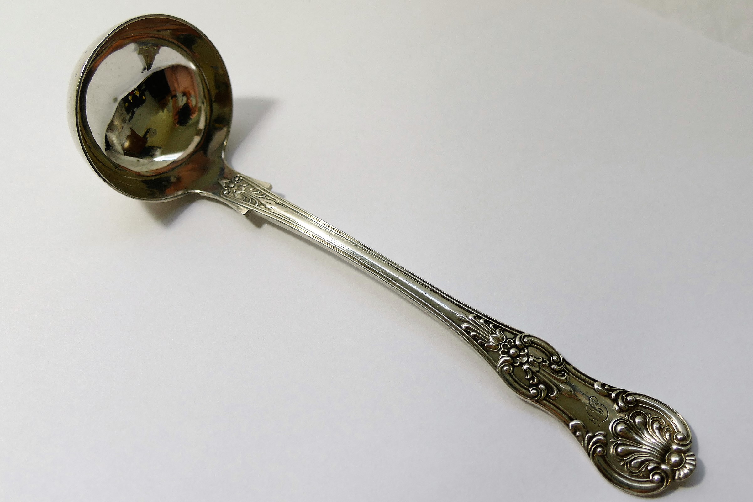 A Victorian Scottish silver Queens pattern Toddy Ladle, Glasgow 1861, 16.8cm long, 1.61ozt, 50.