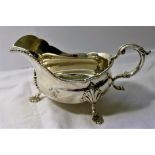 A large Regency design gravy boat with gadrooned decoration, Birmingham 1960, 10.2ozt, 317.