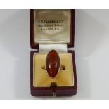 A rose gold carnelian single stone ring,