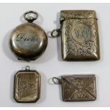 A Victorian silver sovereign holder, Birmingham 1895, an Edwardian silver vesta case, Chester 1906,