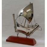 A silver coloured metal model of a sailing boat, stamped 'Silver' and '925', 16cm high, 2.85ozt, 88.