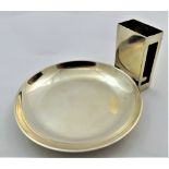 A George V silver combination ashtray and match box holder, London 1924, tray 8.5cm diameter, 3.