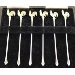 A cased set of six George VI silver cocktail sticks with gilded cockerel finials, Birmingham 1936,