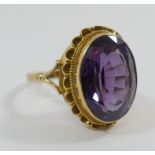 A 9 carat gold synthetic colour change sapphire single stone ring, Birmingham 1973,