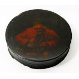 A Georgian papier mache circular lidded snuff box,