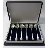 A set of six Victorian silver old English and shell fancy back teaspoons, London 1898, 11cm long,