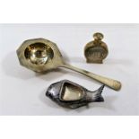 A Japanese silver coloured metal long handled tea strainer by K.