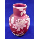 A Thomas Webb cameo glass vase, the cranberry body with white overlaid passion flower decoration,